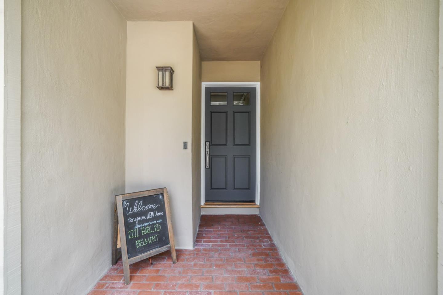 2211 Ewell Road Belmont, CA 94002 - Photo 4 of 44 a view of a hallway with wooden floor