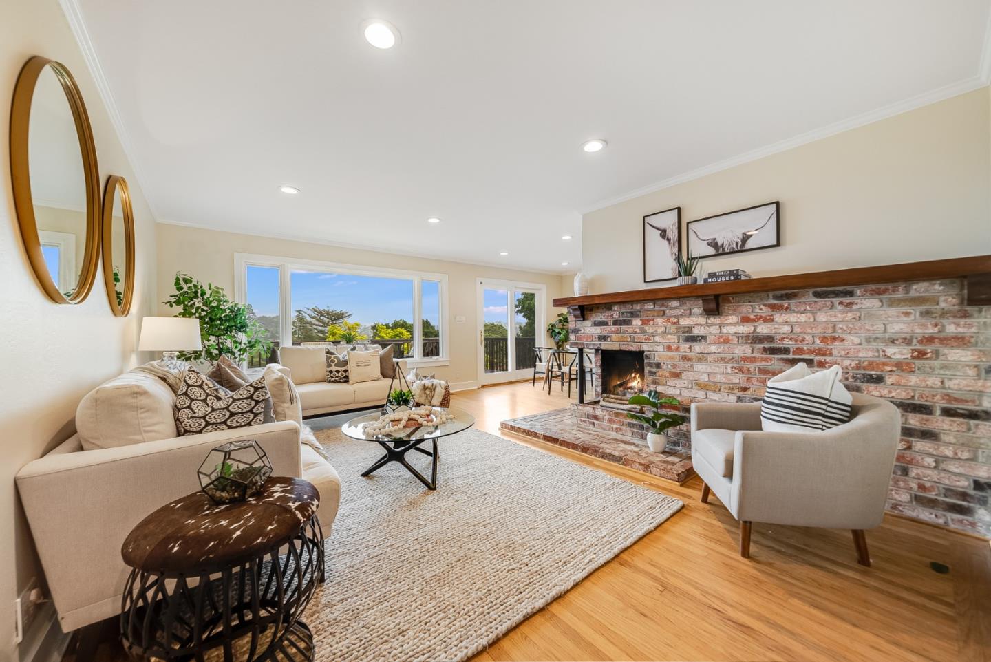 2211 Ewell Road Belmont, CA 94002 - Photo 5 of 44 a living room with furniture a fireplace and a table
