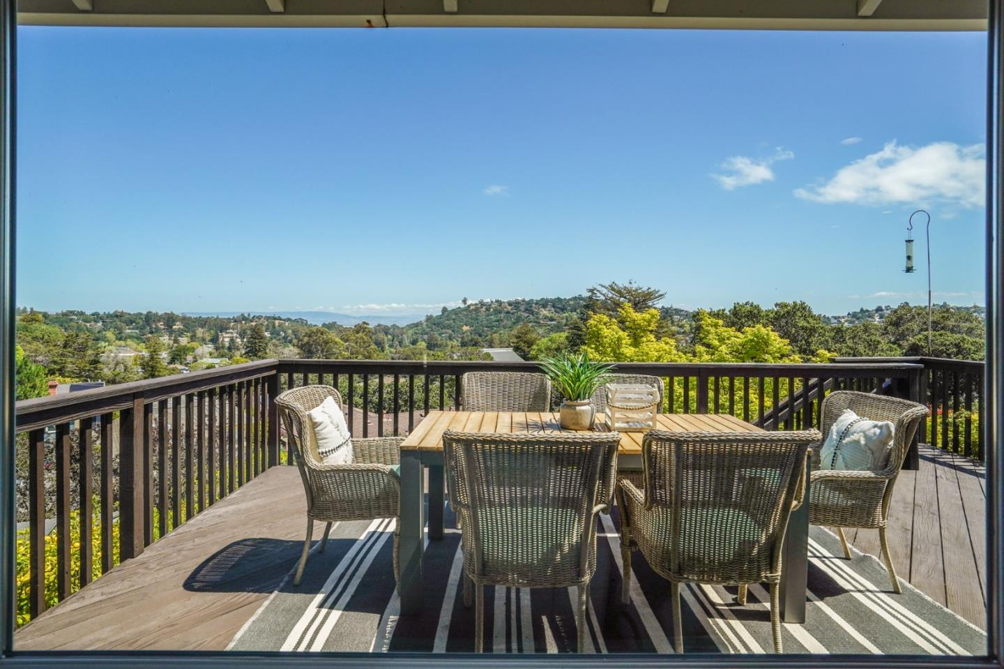 2211 Ewell Road Belmont, CA 94002 - Photo 8 of 44 a view of a chairs and table on the roof deck