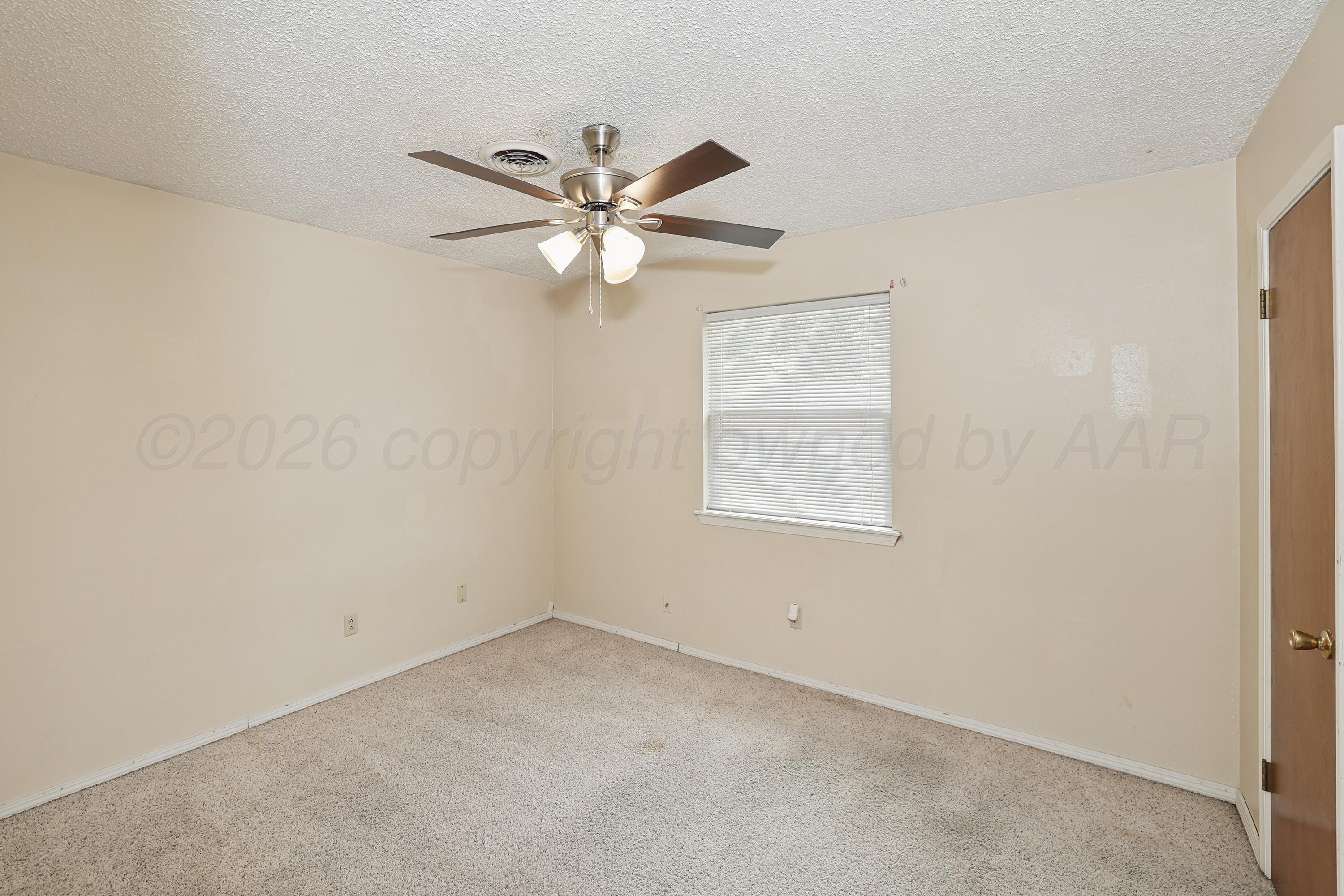 5316 Capulin Lane Amarillo, TX 79110 - Photo 16 of 25 16-2nd Bedroom