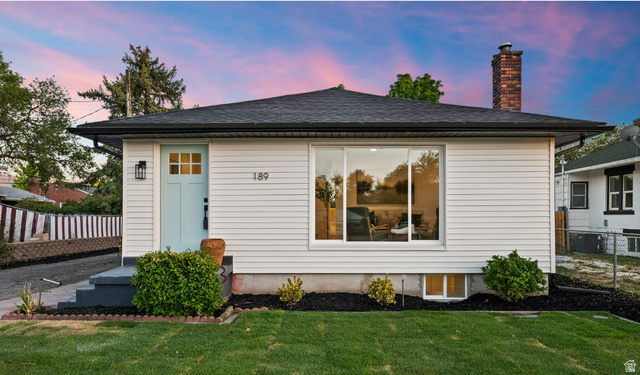 189 West Center Street Midvale, UT 84047 - Photo 2 of 64 White horizontal siding exterior with a slate-tone roof