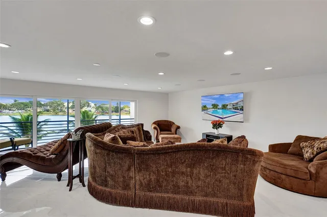 a bed room with a bed and a television