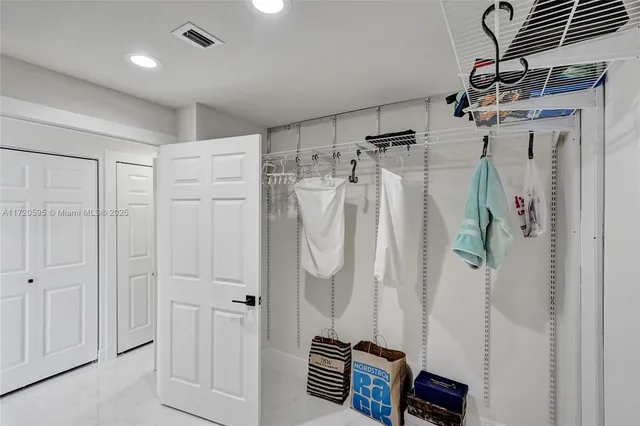 a view of a chair and table in the balcony