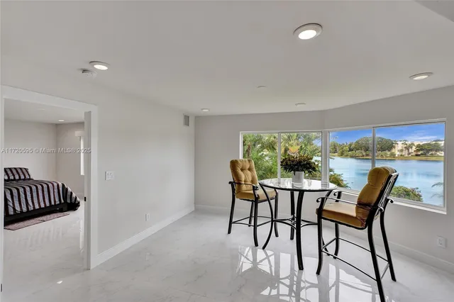 a view of a hallway with wooden shelves