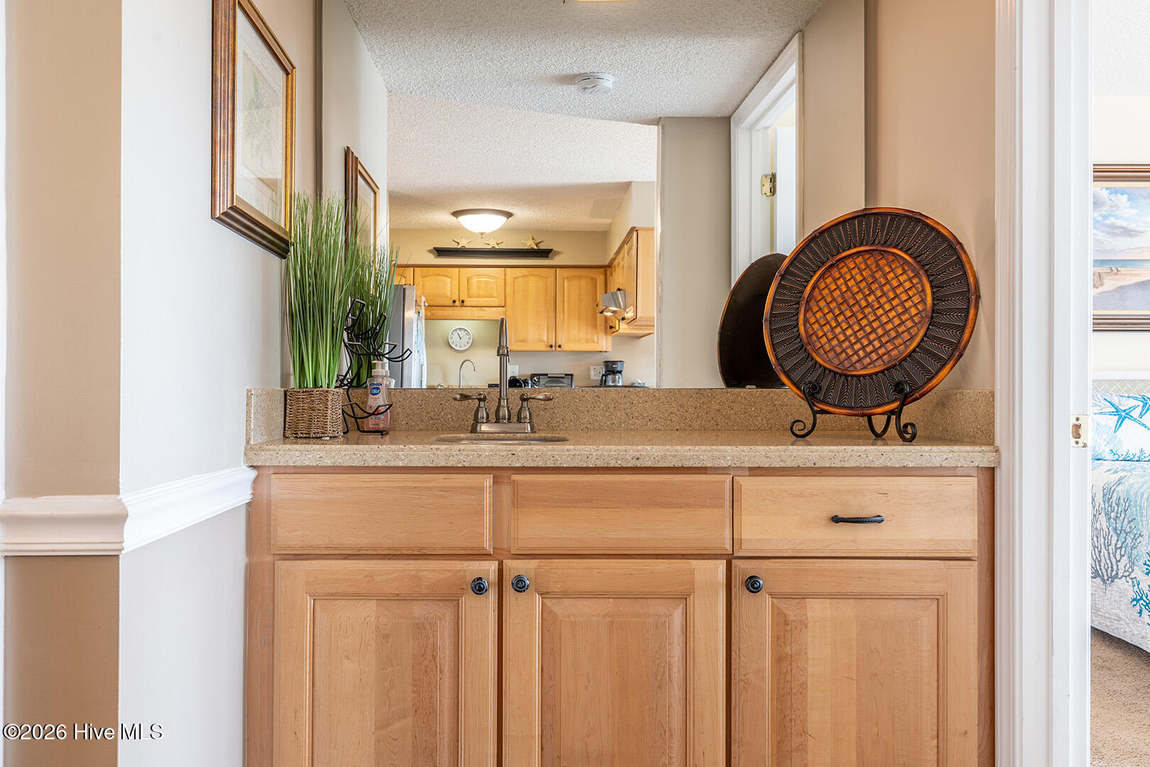 9201 Coast Guard Road, Unit B204 Emerald Isle, NC 28594 - Photo 13 of 29 Bar with sink & solid surface tops