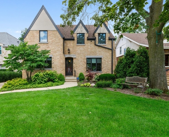 11 Wisner Street Park Ridge, IL 60068 - Photo 1 of 29 a front view of a house with a garden and yard