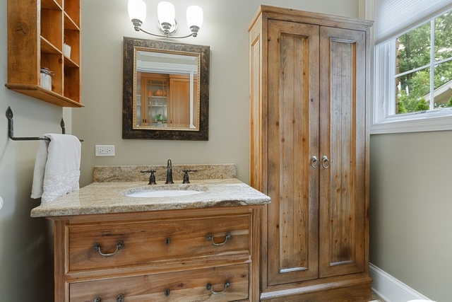11 Wisner Street Park Ridge, IL 60068 - Photo 14 of 29 a bathroom with a granite countertop sink a mirror and shower