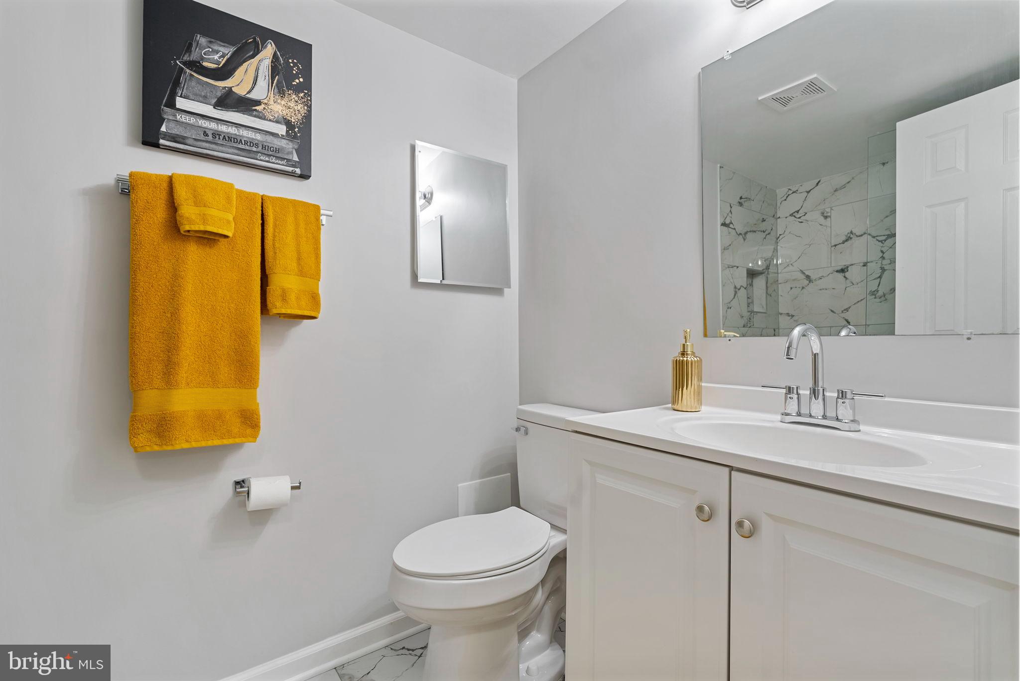 790 Quince Orchard Boulevard, Unit 202 Gaithersburg, MD 20878 - Photo 17 of 25 Bright and modern bathroom with stylish accents.