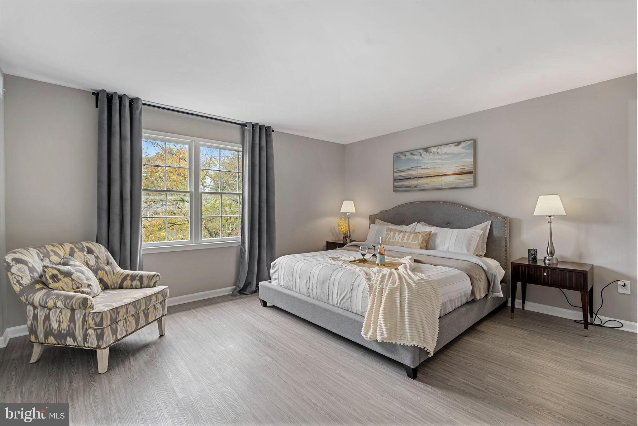 790 Quince Orchard Boulevard, Unit 202 Gaithersburg, MD 20878 - Photo 8 of 25 Spacious primary suite overlooking green space