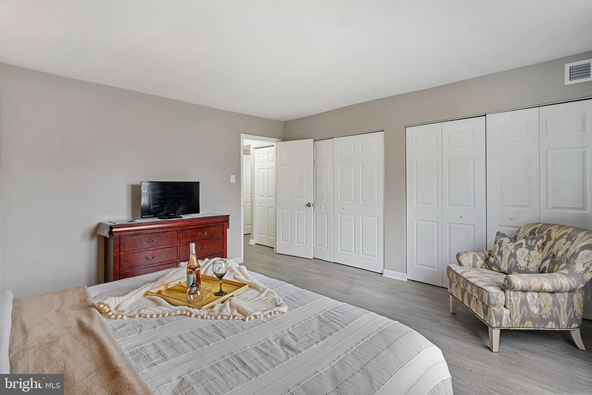 790 Quince Orchard Boulevard, Unit 202 Gaithersburg, MD 20878 - Photo 10 of 25 "Wall of closets"