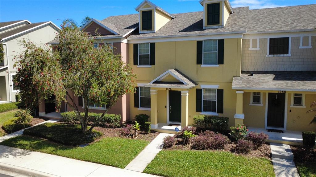 1376 Seburn Road Apopka, FL 32703 - Photo 3 of 32 a front view of a house with a yard