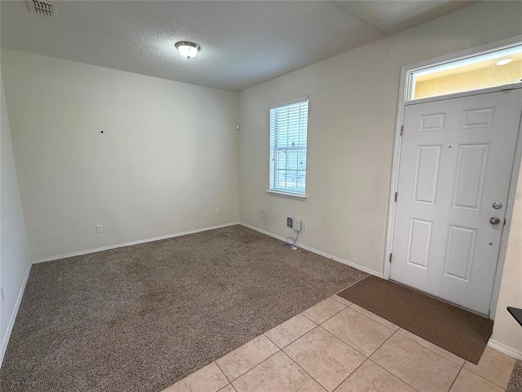 1376 Seburn Road Apopka, FL 32703 - Photo 6 of 32 a view of an empty room and window