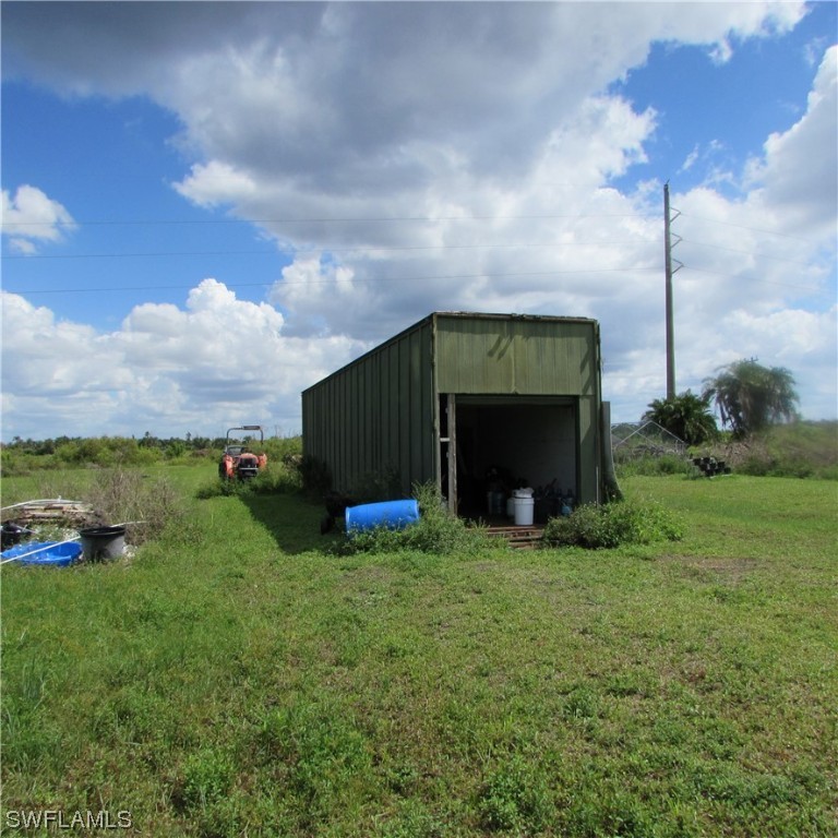 6700 Stringfellow Road St. James City, FL 33956 - Photo 24 of 25 a view of a green field