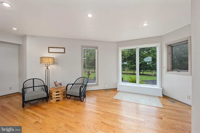 a living room with furniture and window