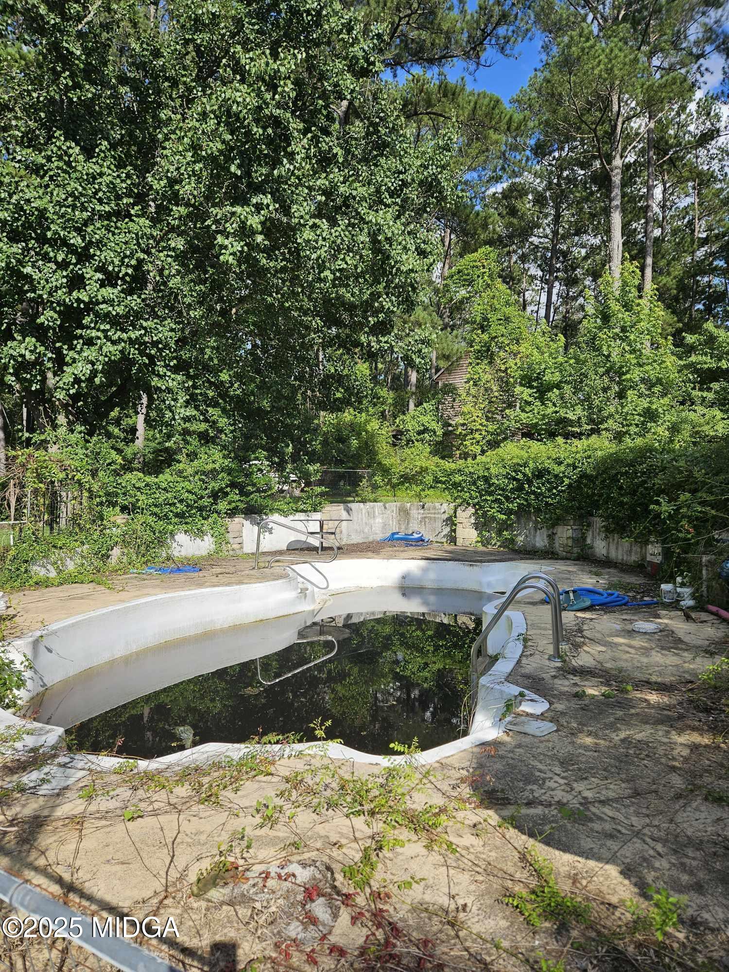 156 Rose Down Avenue Gray, GA 31032 - Photo 11 of 46 a view of a pathway of a yard