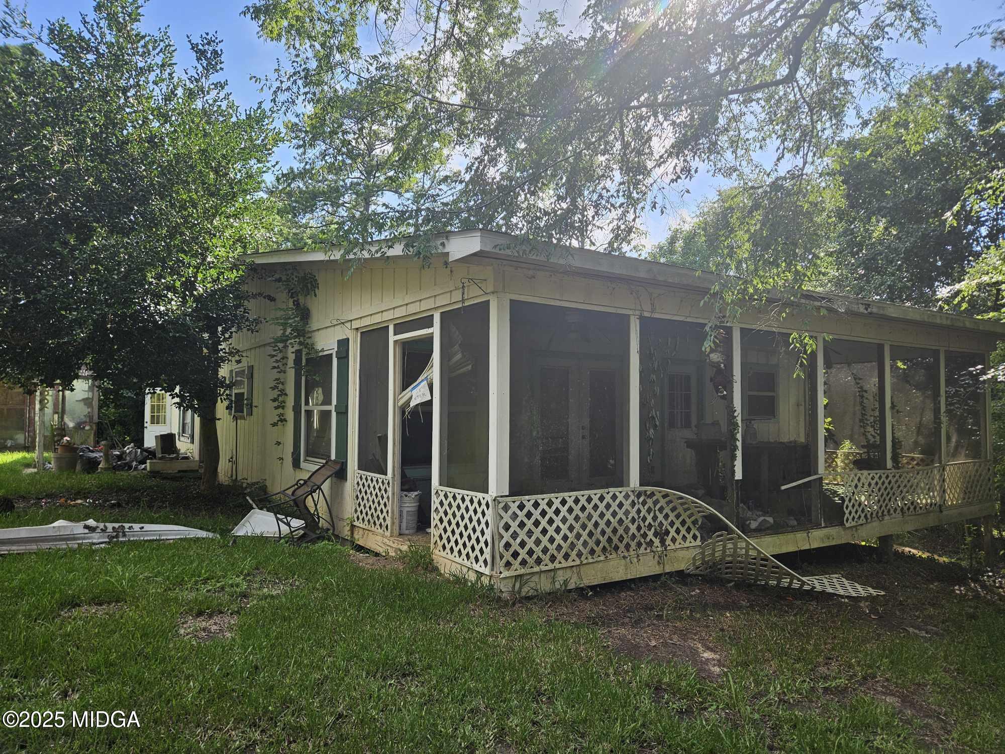 156 Rose Down Avenue Gray, GA 31032 - Photo 15 of 46 a view of a barn with a yard