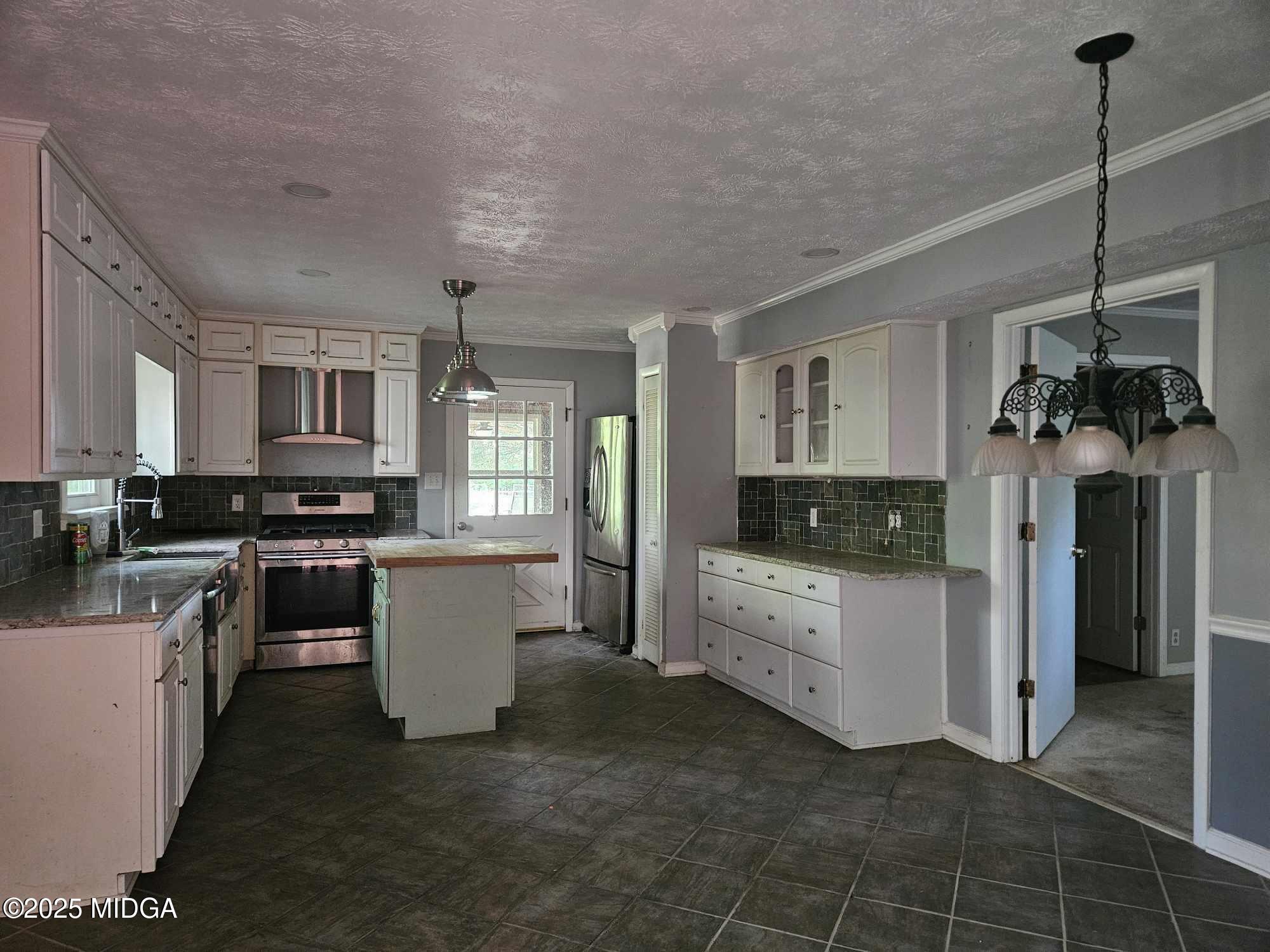 156 Rose Down Avenue Gray, GA 31032 - Photo 21 of 46 a kitchen with a refrigerator a stove top oven a sink dishwasher and a fireplace