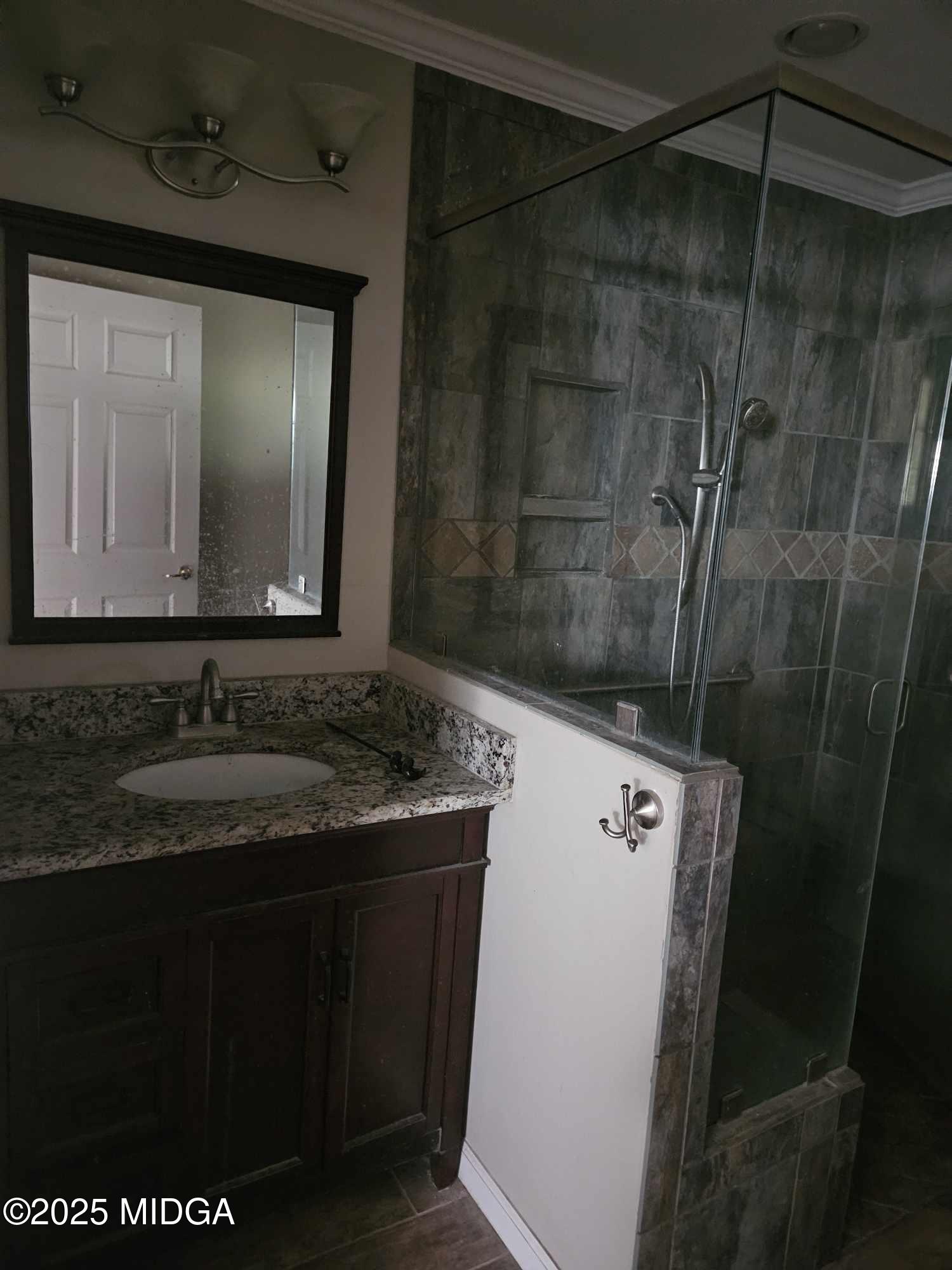 156 Rose Down Avenue Gray, GA 31032 - Photo 26 of 46 a bathroom with a sink and mirror