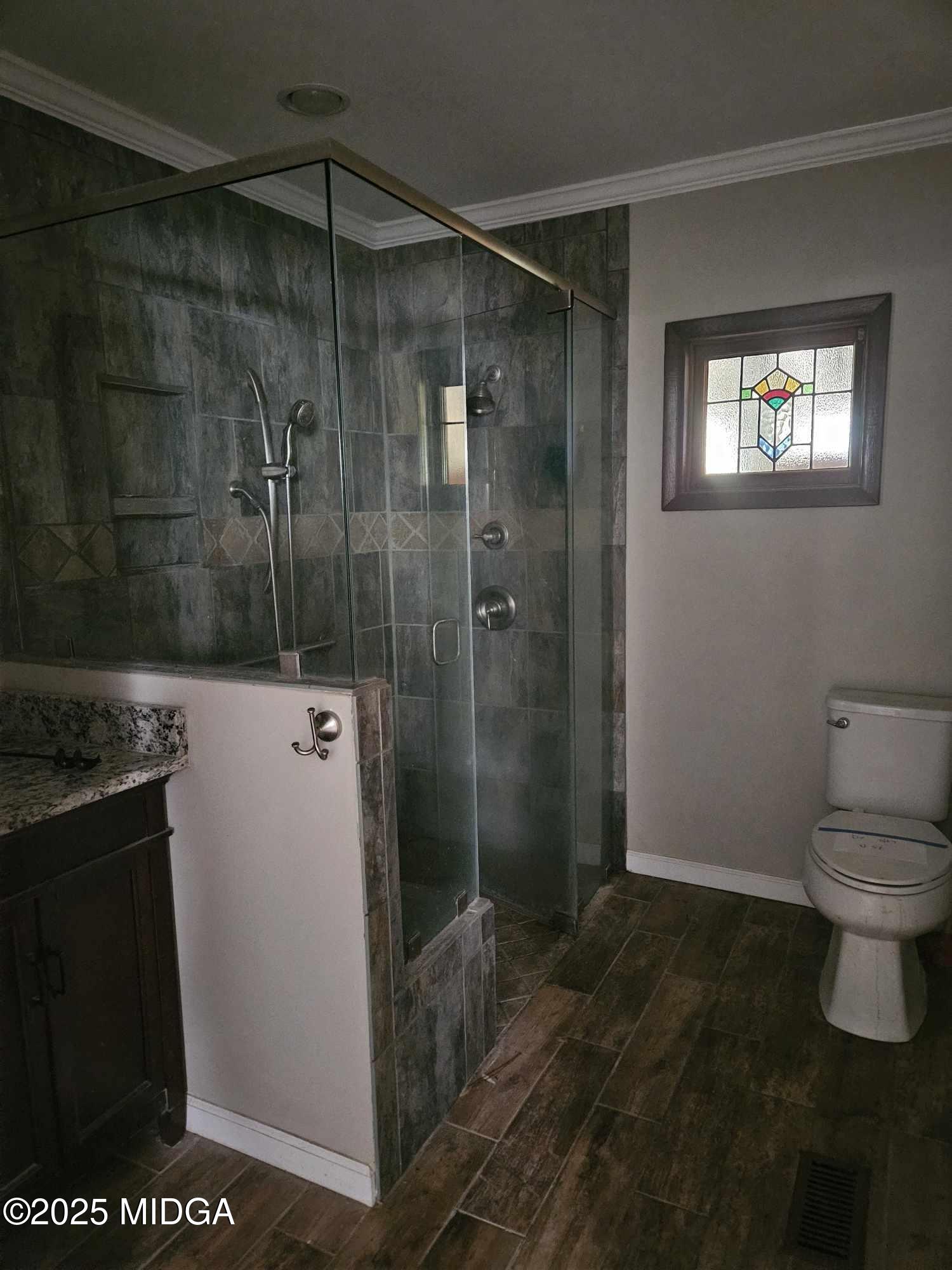 156 Rose Down Avenue Gray, GA 31032 - Photo 27 of 46 a bathroom with a toilet and a shower