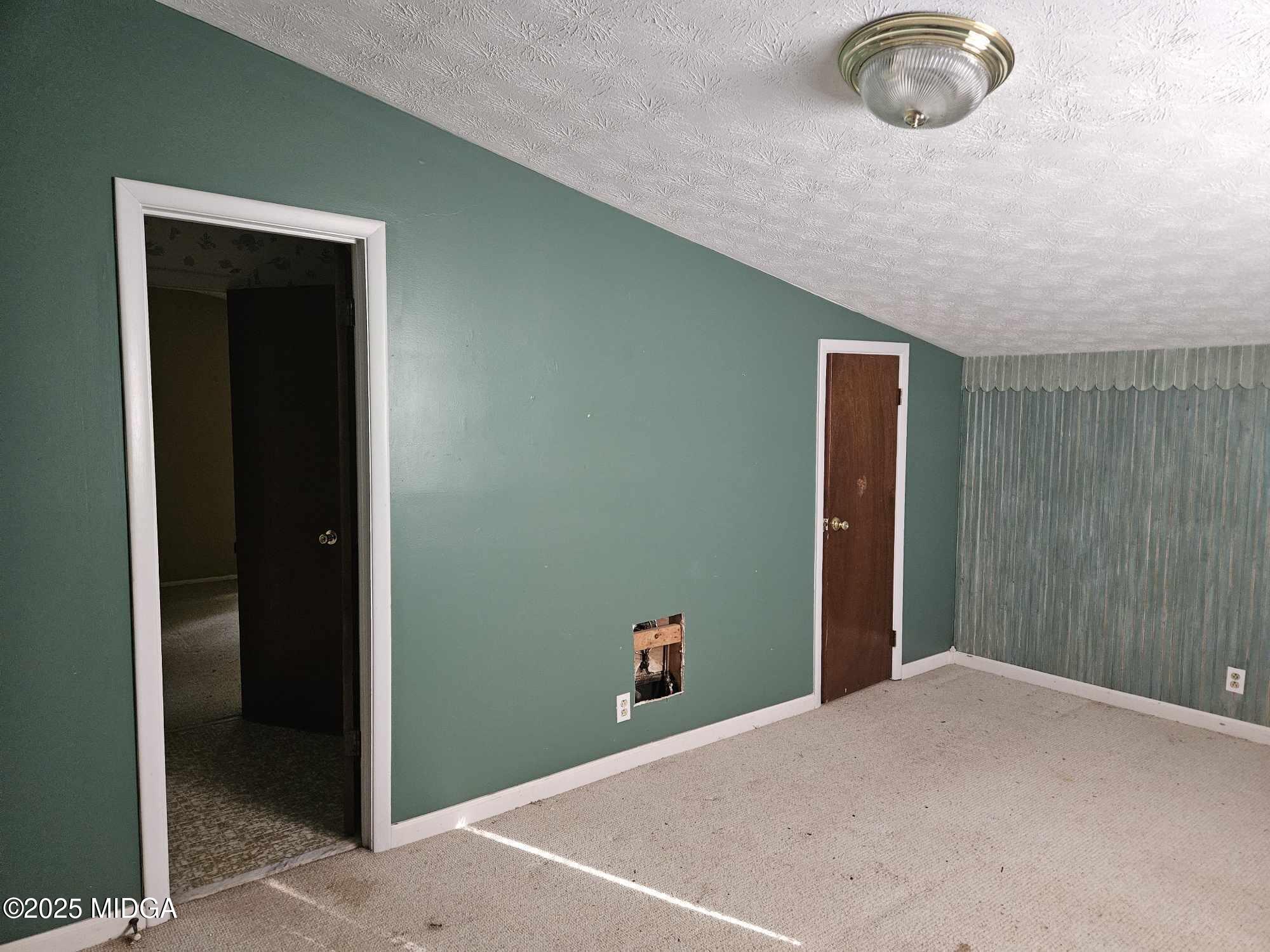 156 Rose Down Avenue Gray, GA 31032 - Photo 36 of 46 a view of a hallway to a room