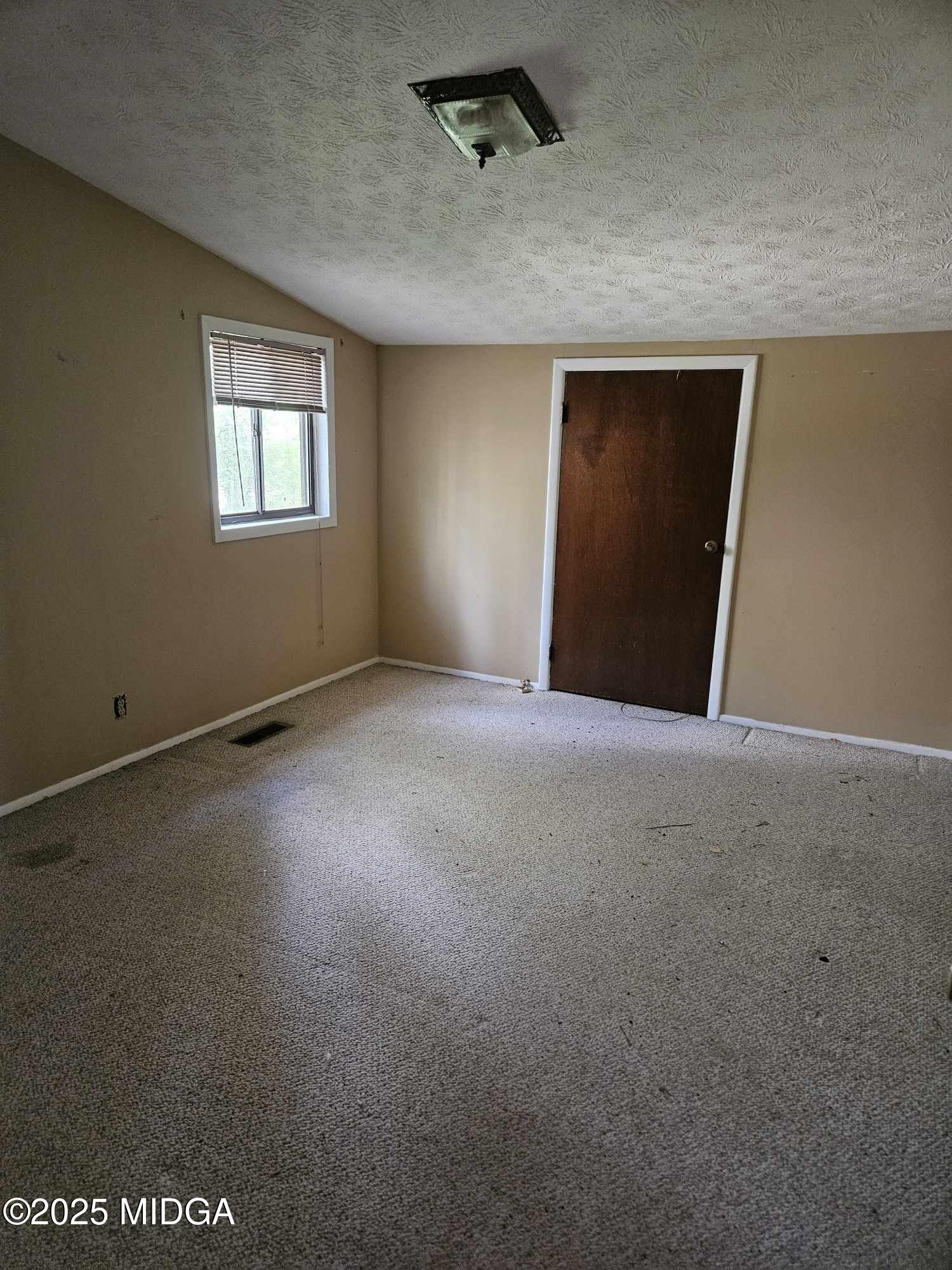 156 Rose Down Avenue Gray, GA 31032 - Photo 38 of 46 a view of an empty room with a window