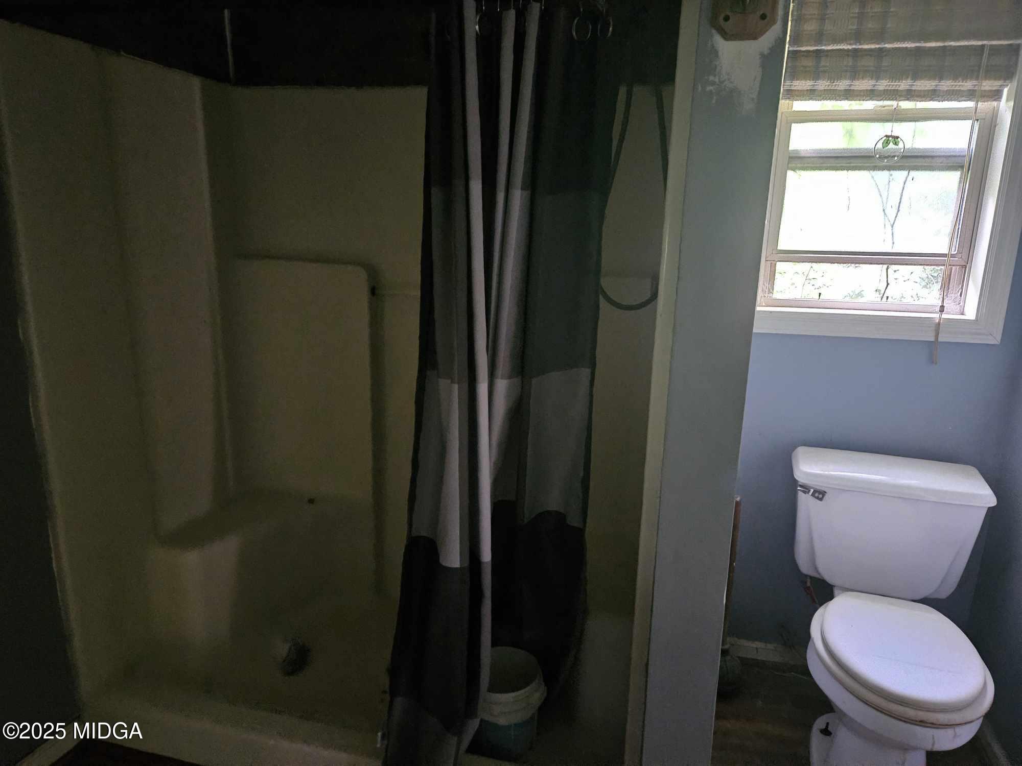 156 Rose Down Avenue Gray, GA 31032 - Photo 45 of 46 a white toilet sitting next to a bathroom