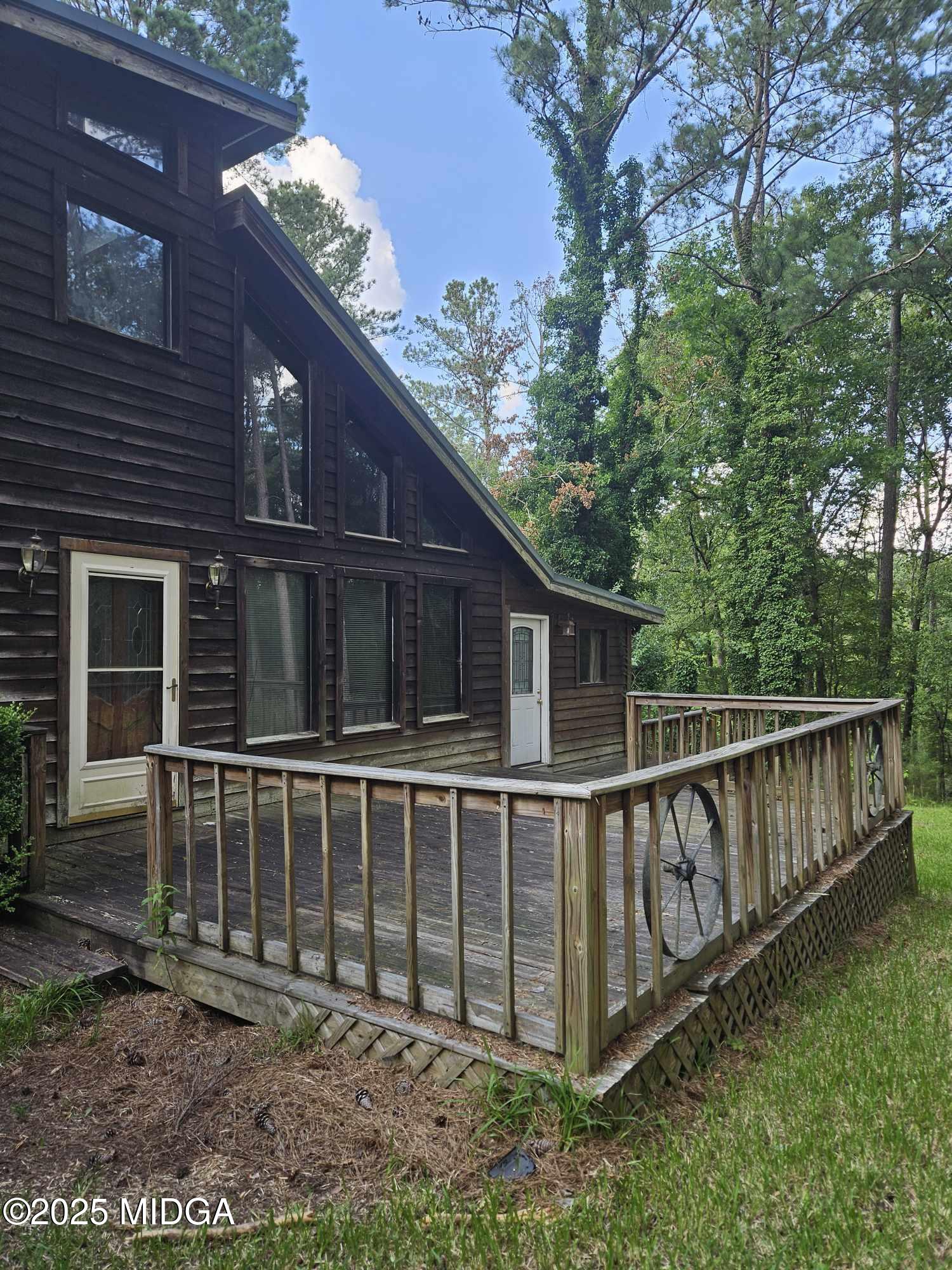 156 Rose Down Avenue Gray, GA 31032 - Photo 7 of 46 a view of a house with wooden fence