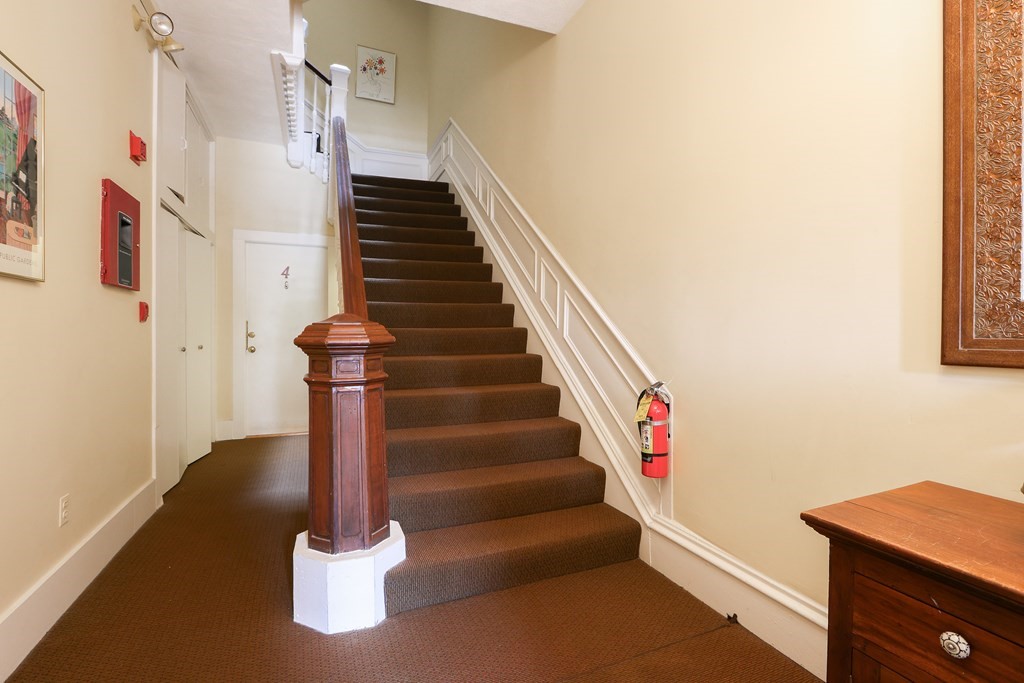 389 Beacon Street, Unit 7 Boston, MA 02116 - Photo 5 of 6 a view of entryway and hall with wooden floor