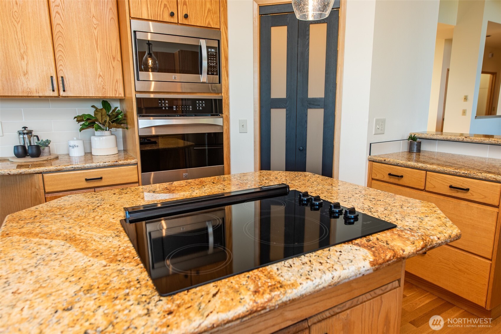 283 Fawn Lane Sequim, WA 98382 - Photo 13 of 38 a kitchen with granite countertop a stove and a sink