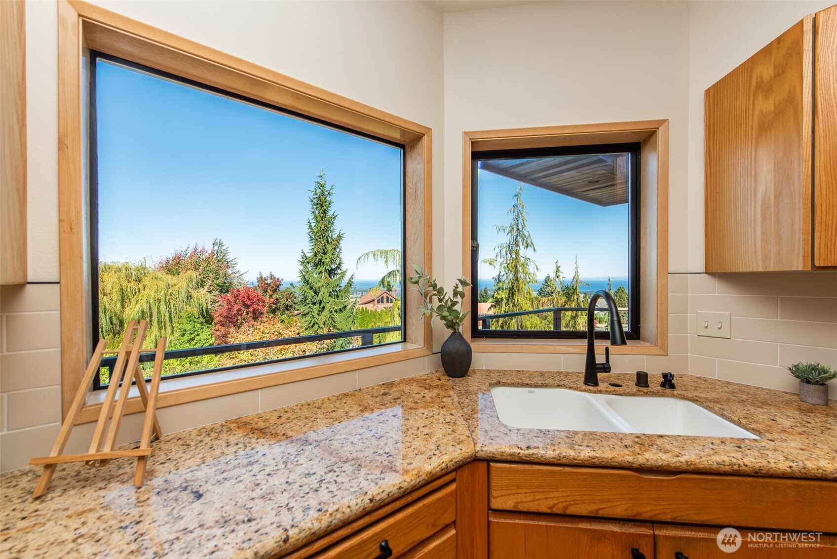 283 Fawn Lane Sequim, WA 98382 - Photo 15 of 38 a bathroom with a granite countertop sink and a large mirror