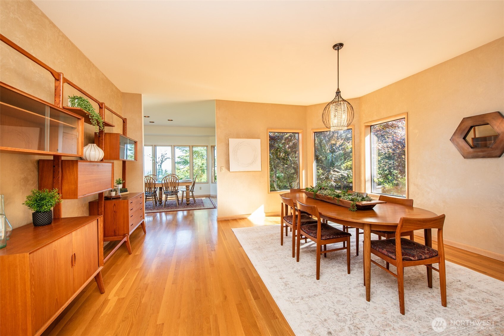 283 Fawn Lane Sequim, WA 98382 - Photo 29 of 38 a view of a dining room and livingroom with furniture wooden floor a chandelier