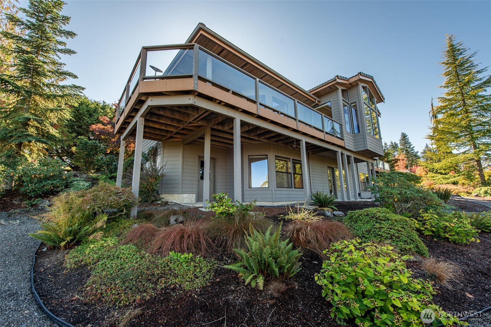 283 Fawn Lane Sequim, WA 98382 - Photo 34 of 38 a front view of a house with a yard