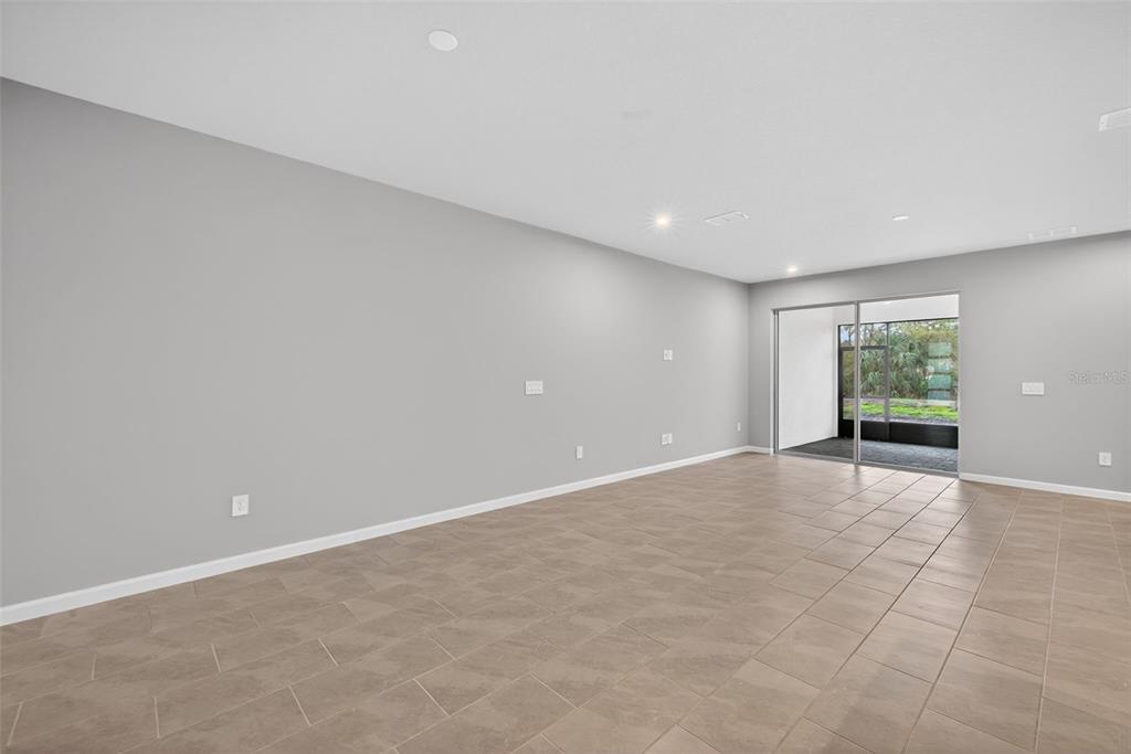 3352 Timber Xing Avenue Brandon, FL 33511 - Photo 13 of 35 a view of an empty room with a window