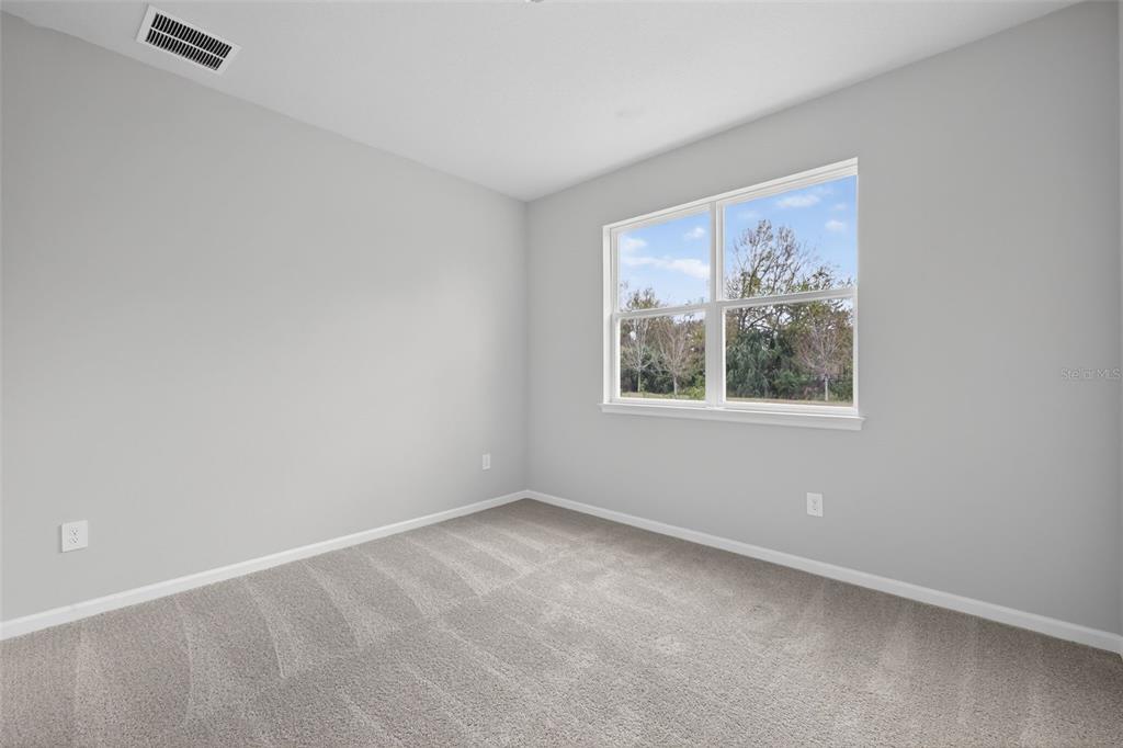 3352 Timber Xing Avenue Brandon, FL 33511 - Photo 16 of 35 an empty room with a window