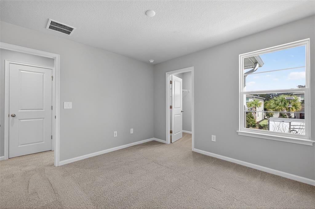 3352 Timber Xing Avenue Brandon, FL 33511 - Photo 26 of 35 a view of an empty room with a window