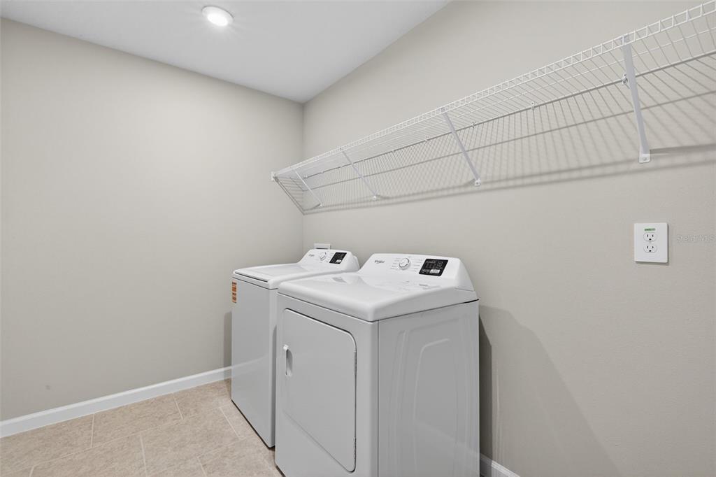 3352 Timber Xing Avenue Brandon, FL 33511 - Photo 28 of 35 a utility room with dryer and washer