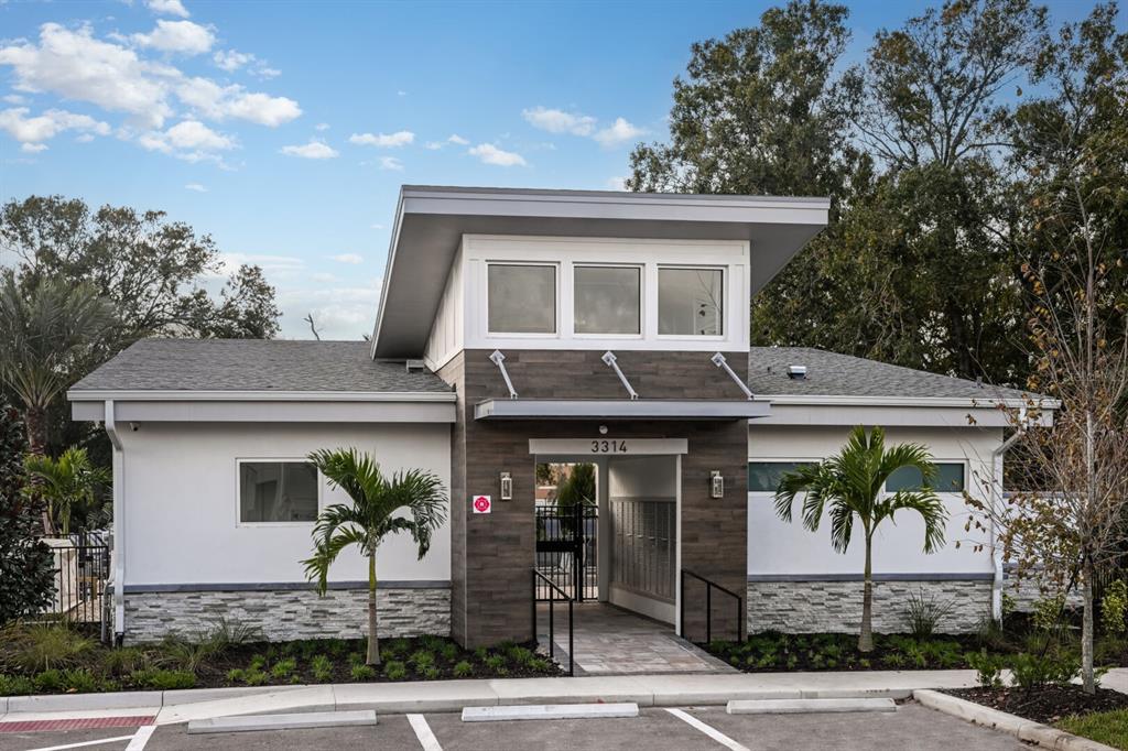 3352 Timber Xing Avenue Brandon, FL 33511 - Photo 32 of 35 a front view of a house with garden