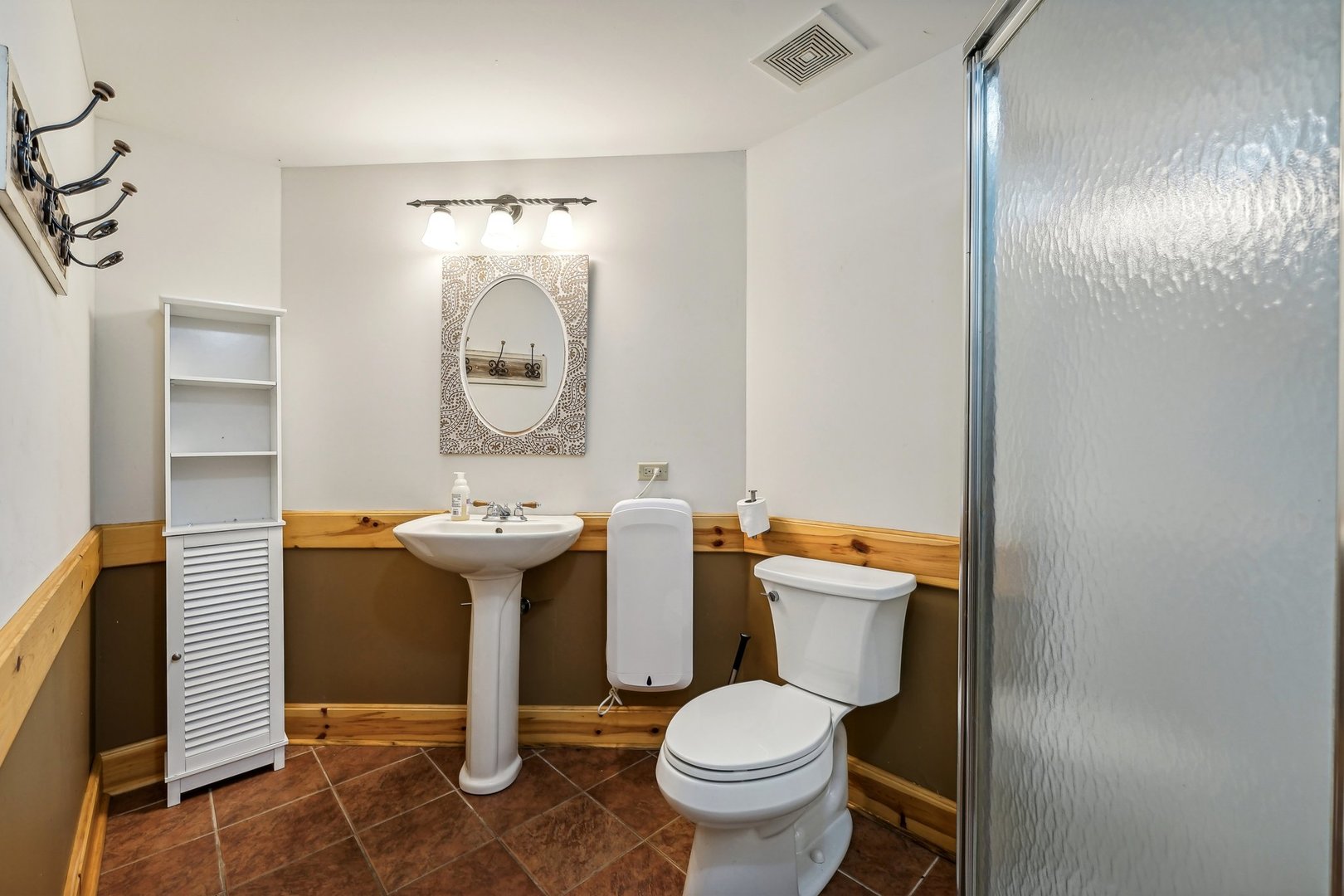 23120 South Hidden Lake Trail Crete, IL 60417 - Photo 29 of 45 a bathroom with a toilet sink and mirror