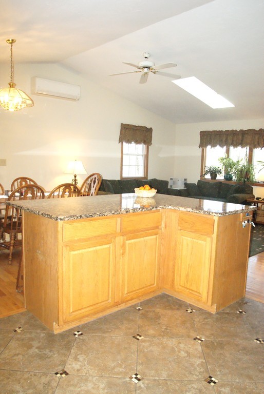 82 Baker Pond Road Dudley, MA 01571 - Photo 6 of 29 a view of a kitchen with a sink