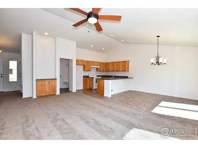 a view of a kitchen with a sink and dishwasher in kitchen