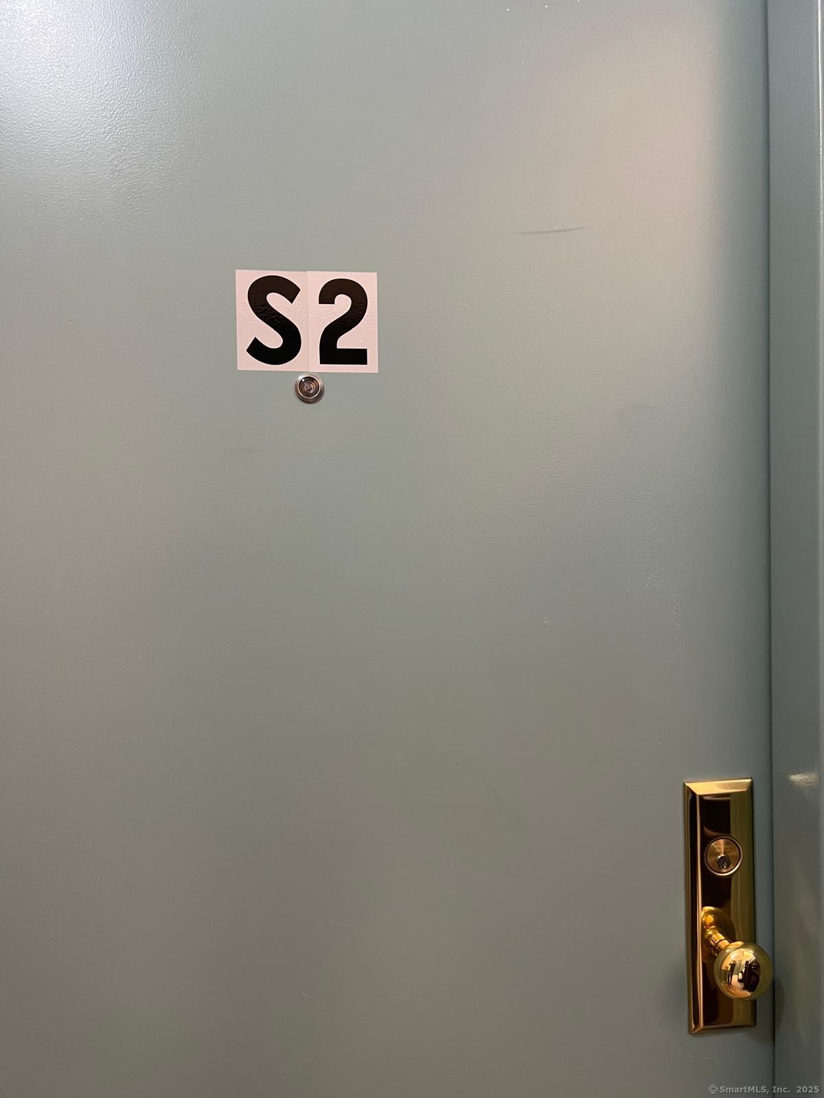 79 Barbour Street, Unit S2 Hartford, CT 06120 - Photo 2 of 7 a view of a entryway with a shower curtain