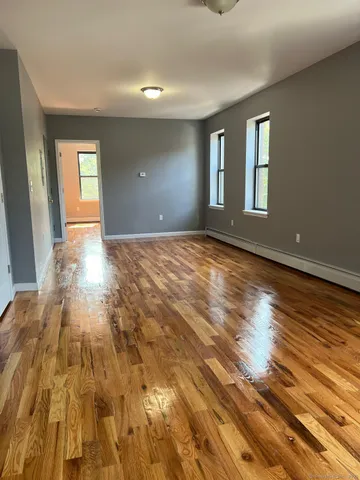 a view of an empty room and window