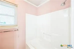 a bathroom with a bathtub