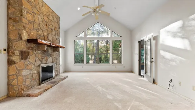 a view of livingroom with window and fireplace