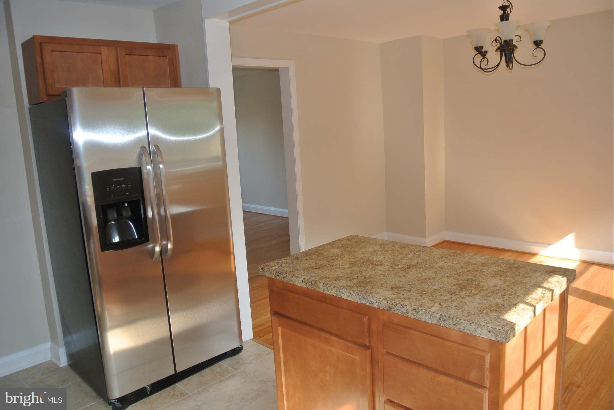 1176 Newfield Road Baltimore, MD 21207 - Photo 9 of 25 Kitchen with island