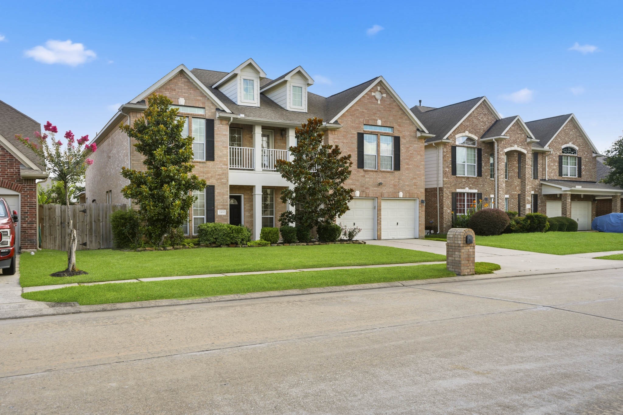 3306 Colleville Sur Mer Lane Spring, TX 77388 - Photo 2 of 30 The expansive front lawn provides plenty of open green space and showcases the home's impressive presence.