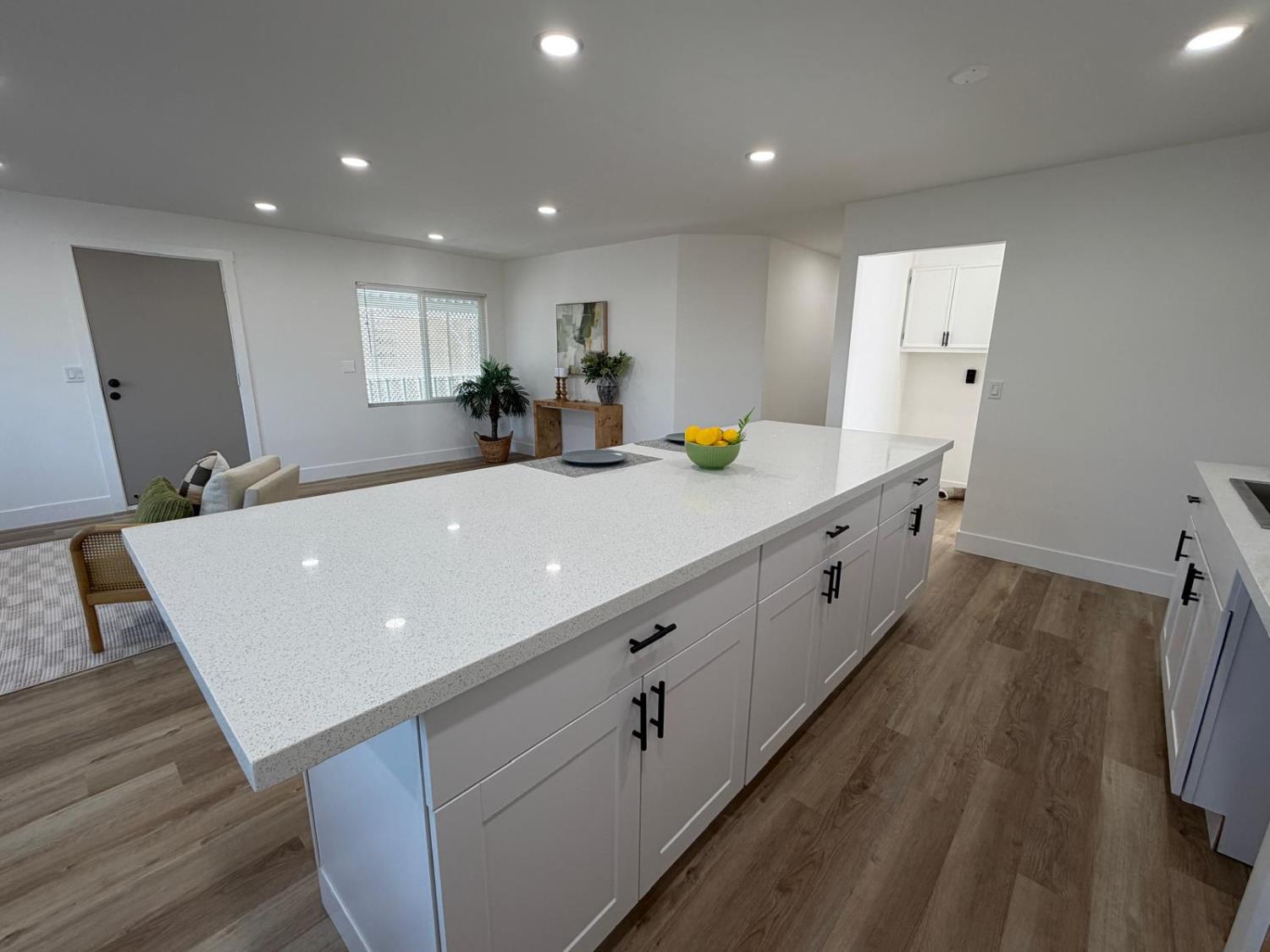 3 Rimma Way Roseville, CA 95661 - Photo 11 of 38 a large kitchen with stainless steel appliances a lot of counter space and wooden floor