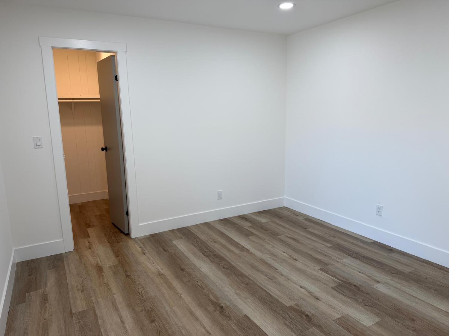 3 Rimma Way Roseville, CA 95661 - Photo 17 of 38 a view of an empty room and wooden floor