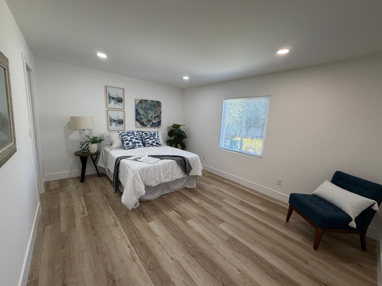 3 Rimma Way Roseville, CA 95661 - Photo 20 of 38 a bedroom with a bed and a couch