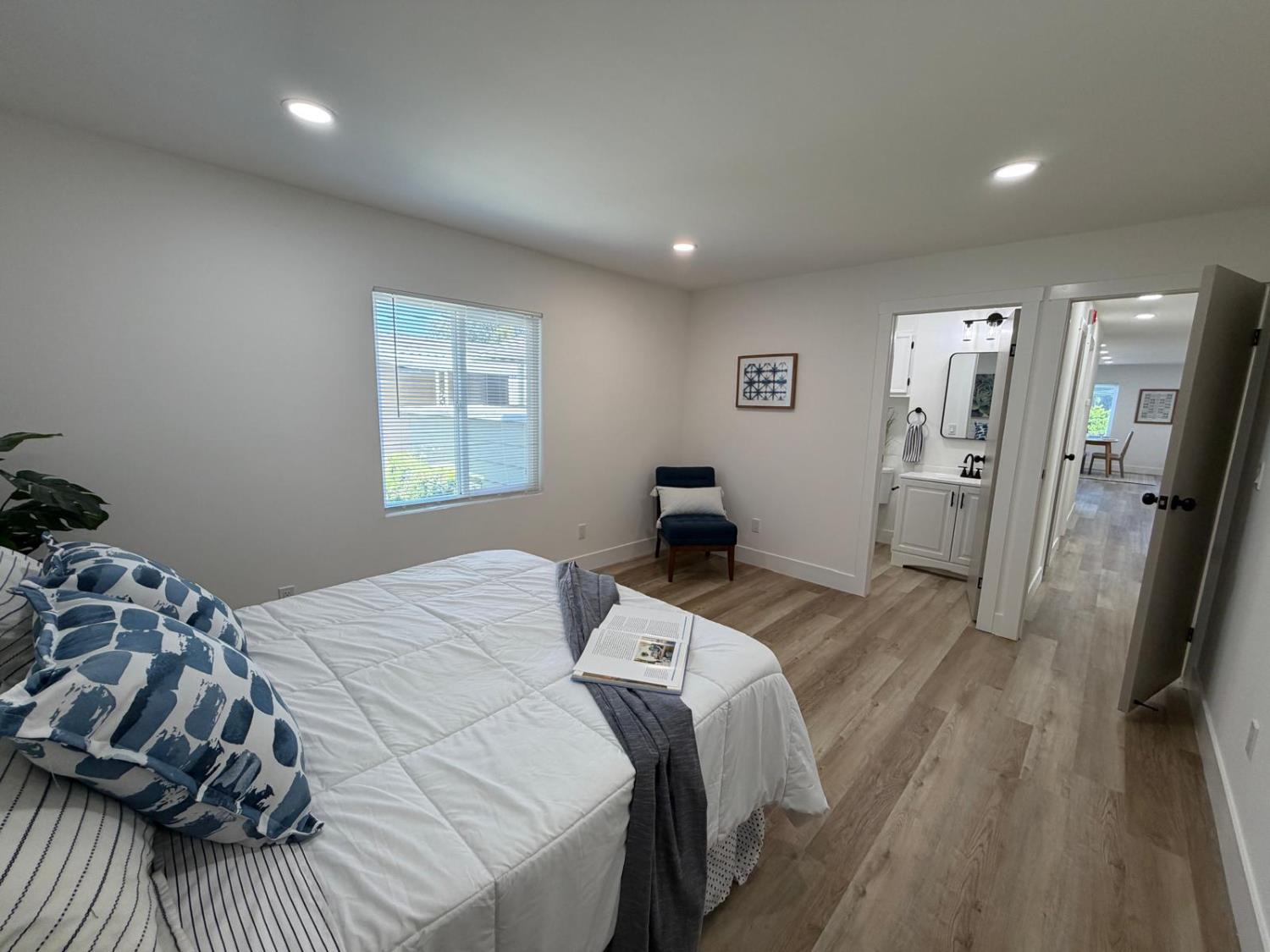 3 Rimma Way Roseville, CA 95661 - Photo 21 of 38 a bedroom with a bed and wooden floor